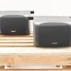 Stylish vintage AKAI speakers on wooden pallet, ideal for audiophiles and design lovers.