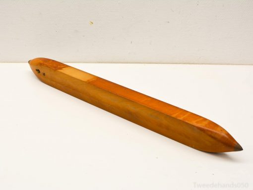 Sleek wooden tool with a polished finish, ideal for decor or creative crafting.