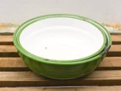 Charming retro green nesting bowls set, perfect for stylish kitchen use and cozy meals.