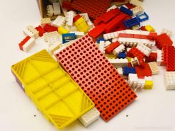 Colorful plastic building blocks spark creativity and imaginative play for all ages.