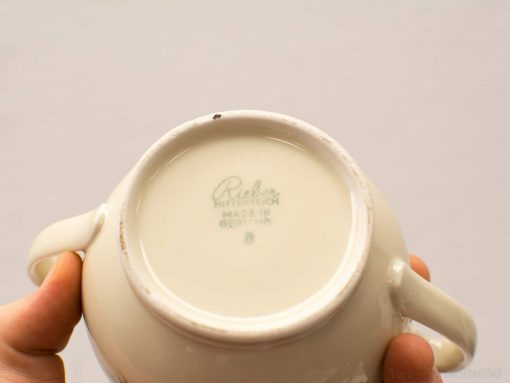 Elegant vintage porcelain bowl by Rieber Mittereich, showcasing fine craftsmanship and historical charm.