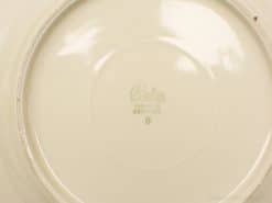 Elegant off-white R. S. Prussia ceramic plate, made in Germany, showcasing timeless craftsmanship.