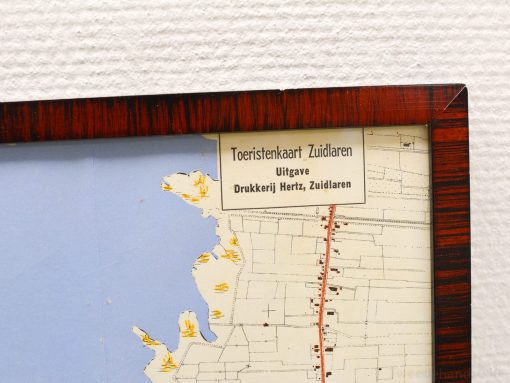 Vintage Zuidlaren tourist map in a wooden frame, highlighting historical routes and waterways.