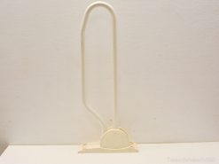 Minimalist bathroom support handle for stability and comfort near toilets and showers.