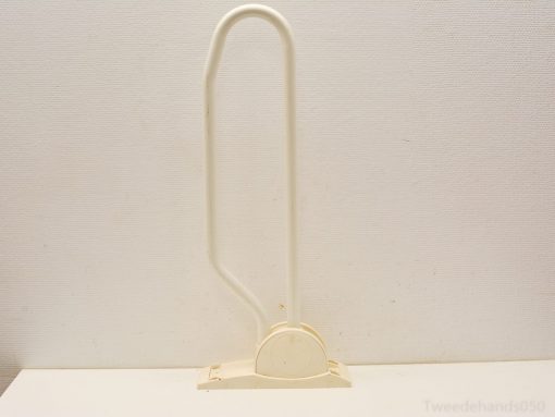 Minimalist bathroom support handle for stability and comfort near toilets and showers.