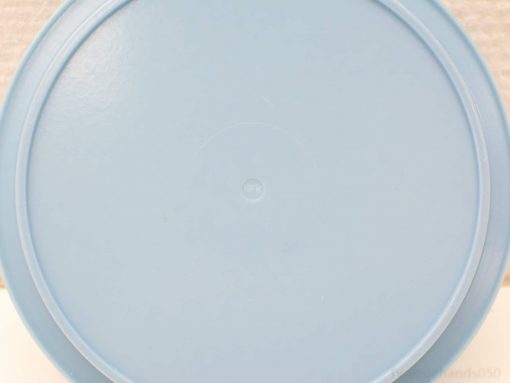 Stylish light blue vintage container for efficient storage and organization in any home.