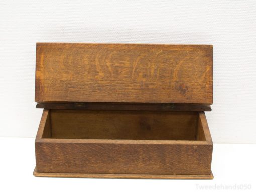 Handcrafted rustic wooden box with hinged lid, ideal for storing keepsakes and enhancing decor.