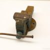Vintage blue bench vise, sturdy and reliable for woodworking and metalworking projects.
