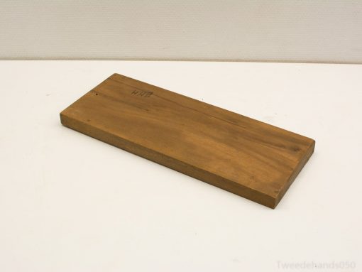 Versatile wooden plank with natural grain, polished edges—perfect for crafting or cutting tasks.