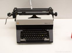 Vintage Triumph Matura 375 typewriter: elegant black-and-white design for nostalgic writers.