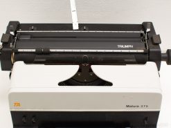 Classic Triumph Matura 375 typewriter showcasing retro design and tactile QWERTY keys.