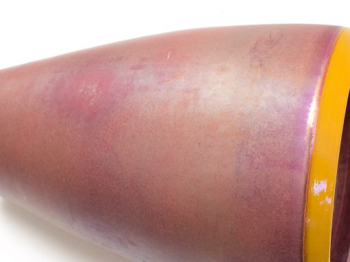 Elegant purple ceramic vase with yellow rim and stunning color gradient for versatile decor.