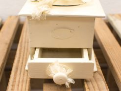 Charming vintage decorative box with drawer, lace detail, and creamy white finish. Perfect for any decor.