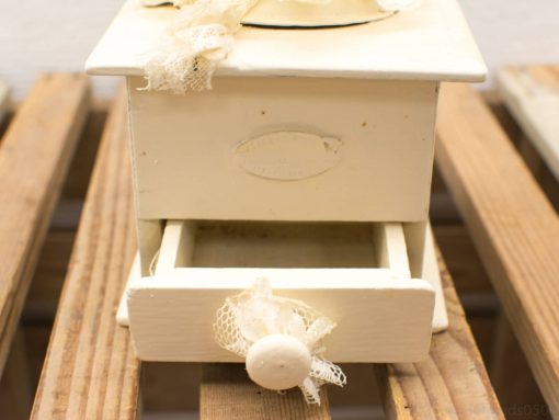 Charming vintage decorative box with drawer, lace detail, and creamy white finish. Perfect for any decor.