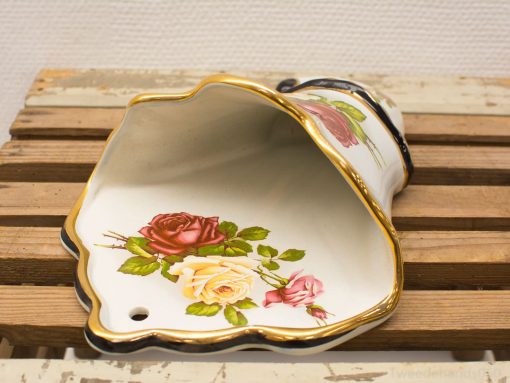 Elegant porcelain shell planter featuring hand-painted roses and luxurious gold trim.