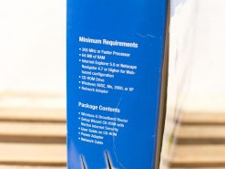 Linksys Wireless G Router box with setup requirements and package contents for home networking.