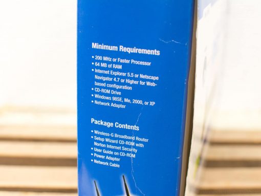 Linksys Wireless G Router box with setup requirements and package contents for home networking.