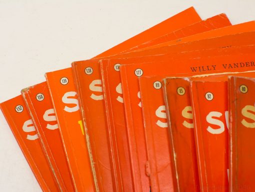 Vintage magazines collection featuring Willy Vander, issue numbers 80 to 152, bright orange covers.
