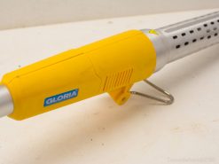 Powerful yellow outdoor tool for effective weed removal, featuring ergonomic design and reliable performance.