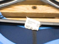 Blue and black neoprene-nylon wetsuit for comfortable and durable water sports.