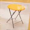 Bright orange folding table with metal legs, ideal for indoor gatherings and compact spaces.
