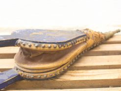Vintage blue leather bellows with patina for fire stoking or rustic home decor.