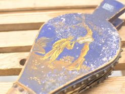 Antique wooden bellows with vibrant artwork and intricate natural designs, perfect for vintage collectors.