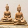 Serene dual Buddha sculptures for meditation, exuding tranquility and wisdom in your space.
