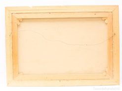 Rustic wooden frame showcasing vintage artwork, featuring a charming aged finish and sturdy construction.