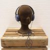 Stylish navy blue Sony AEC headphones with comfortable cushions and vintage quality.