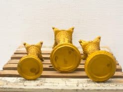 Elegant golden decorative objects set for stylish home décor and chic tabletop displays.
