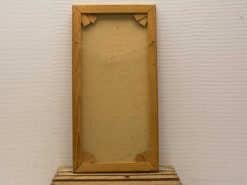 Elegant wooden frame with twine, perfect for showcasing art or photos in any space.