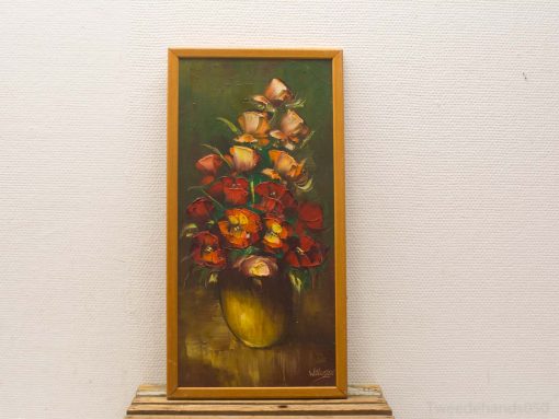 Vibrant floral still life with roses in a earthy vase, perfect for home decor.