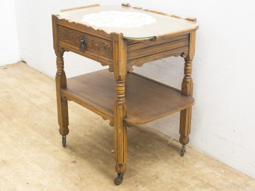 Elegant vintage wooden side table with stunning inlay and practical drawer storage.