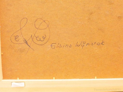Elegant canvas backing featuring signature of artist Elaine Wynatak with intricate initials.