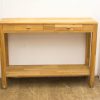 Elegant light wood console table with drawers, perfect for stylish storage and decoration.