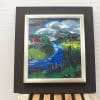 Vibrant rural landscape painting featuring a winding river and charming cottage, perfect for any decor.