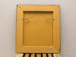Vintage yellow frame with warm beige backing, perfect for adding country charm to any space.