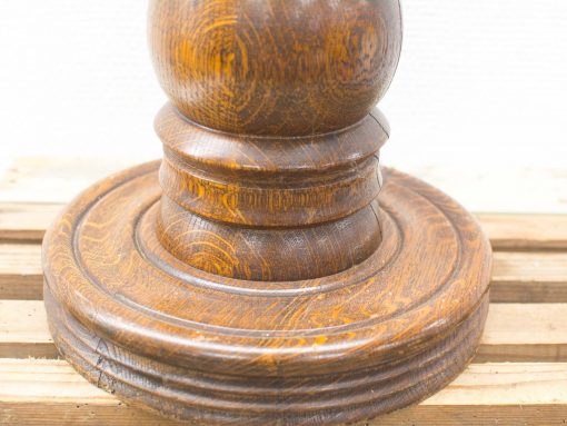 Elegant wooden lamp base, handcrafted from solid oak, exuding timeless charm and quality.