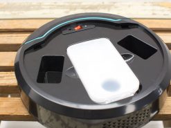 Sleek robotic vacuum cleaner with advanced smart features and stylish black design.