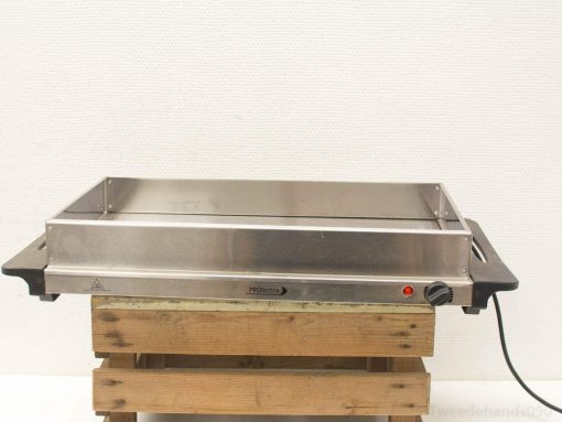 Stainless steel electric grill on wooden base, perfect for outdoor barbecues and gatherings.
