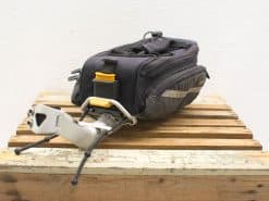 Durable travel bag with tripod support, perfect for outdoor adventures and photography gear.