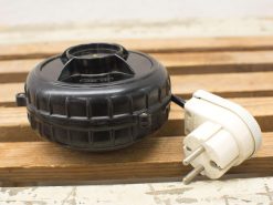 Stylish black electric appliance with grip texture and white plug, ideal for kitchen use.