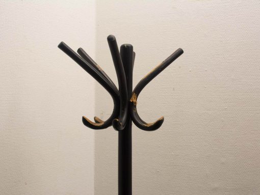 Stylish vintage black coat rack with six curved hooks for modern entryways.