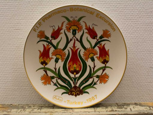 Vibrant 1987 Turkish ceramic plate with botanical motifs, F.I.P. Pharmaco-Botanical Excursion.