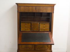 Elegant vintage wooden secretary desk with polished finish and functional writing surface.