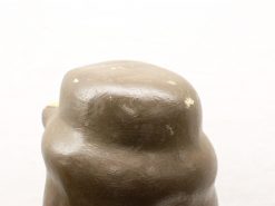 Elegant abstract brown sculpture with glossy finish, embodying warmth and artistic craftsmanship.