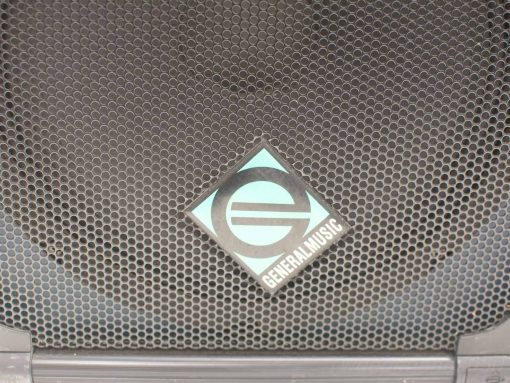 Vintage General Music Elipse LPS 12 speaker grille with honeycomb design and iconic logo.