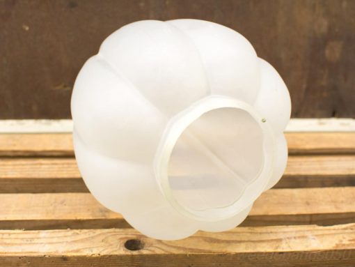 Oversized frosted glass lampshade in flower shape, adding elegance and whimsy to interiors.