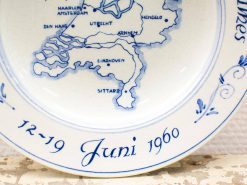 Vintage porcelain plate featuring a map of the Netherlands, dated June 12-19, 1960.